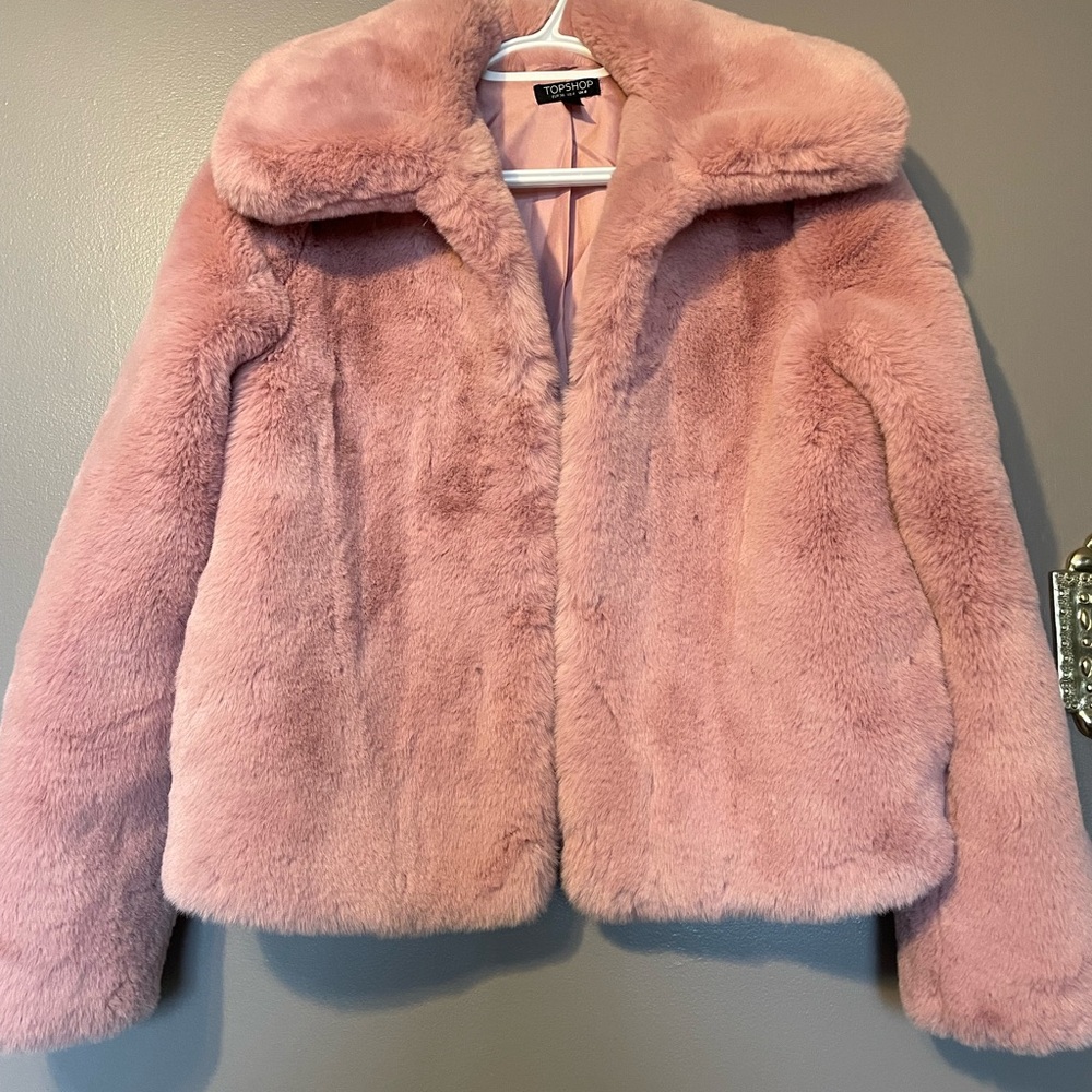 Pink cropped faux fur jacket